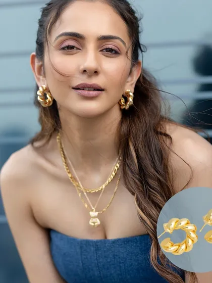 Another shot of Rakul Preet wearing our braided beauty hoops, this time with a layered necklace look. These earrings are truly versatile.