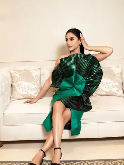 Here is the complete look for Krystle, where the makeup and slicked-back wet hairstyle come together to complement her bold, architectural green dress. This demonstrates how I style a cohesive, head-to-toe appearance for high-fashion events.