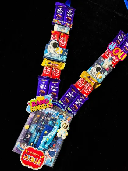 An out-of-this-world chocolate garland with a space theme, perfect for young explorers this Holi.