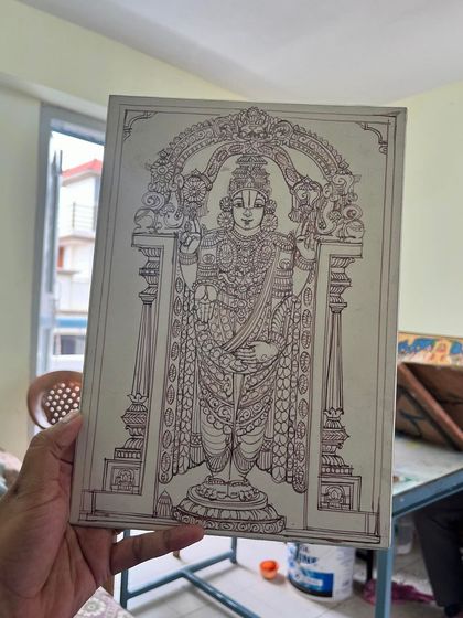 We are working on a compact 11x8 inch board of Lord Balaji. This image shows the completed line drawing, full of intricate details, ready for the next stage of gesso and coloring.