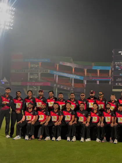 The full squad photo at night, after being crowned champions of the Delhi Premier League.