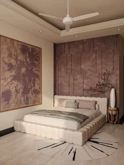 This guest bedroom is a study in softness and charm. A neutral base of creamy whites sets the stage for lilac accents on the textured bed-back wall and in the artwork.