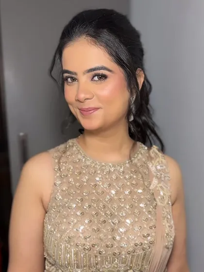 Our "Indian Barbie" look, perfect for a cocktail or reception. The makeup is soft and pretty, with a focus on flawless skin and shimmering eyes, paired with an elegant updo.