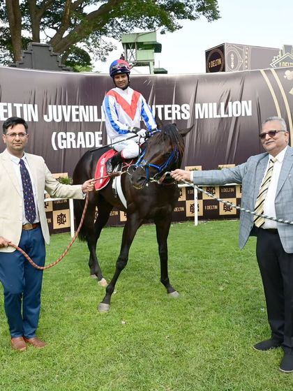 Time and Tide, winner of The Chief Minister's Cup, is pictured with jockey A. Sandesh and the winning owner.