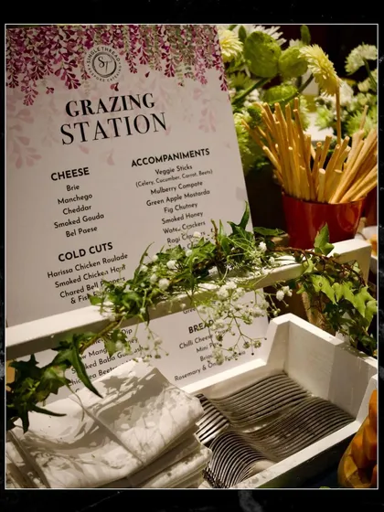 A closer look at the thoughtful details of a curated grazing station. The custom menu, neatly folded napkins, and elegant cutlery are all part of the seamless and professional experience I provide for every event.