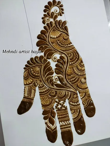 This view shows the full design, from the wrist cuff to the details on the fingertips.