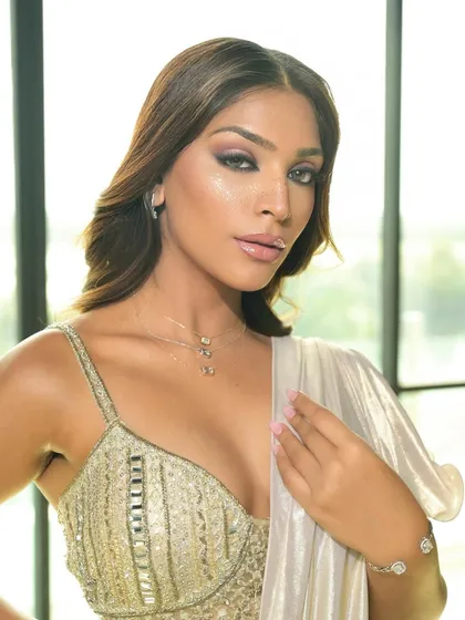 A glamorous "twilight" look perfect for a cocktail party or reception. We used gold face freckles for a touch of whimsy and a smokey eye for drama.