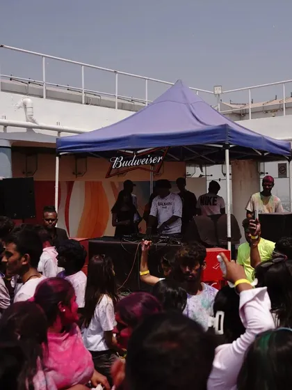 The view of the stage setup at a rooftop Holi party, sponsored by Budweiser. A great setup for a day of music and colors.