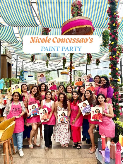 A huge, happy group from Nicole Concessao's birthday paint party. It's always a joy to see so many people come together, enjoy the process, and proudly show off their finished canvases.