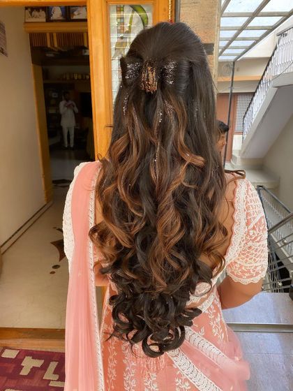 A full view of the highlighted curls, perfect for adding dimension and style to any occasion.