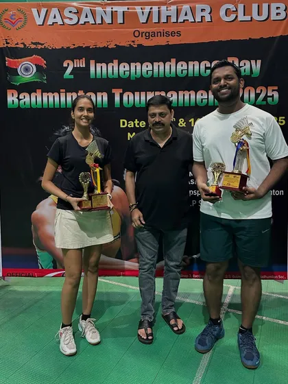 B Group Mixed Doubles winners, Gaurav and Vijeta, celebrating their victory.