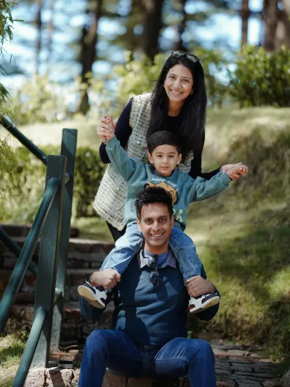 Family portraits are about connection. This outdoor session in the beautiful Shimla landscape allowed for natural, playful interactions, creating a timeless memory of this family's bond.