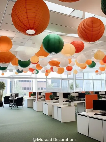 For a subtle yet colorful office decoration, I hung paper lanterns in saffron, white, and green from the ceiling. This creates a bright and cheerful environment perfect for celebrating national holidays.