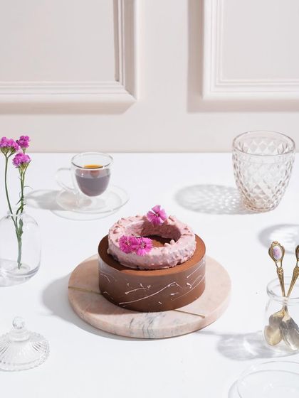 Our Belgian Chocolate and Raspberry Entremet, set for a weekend indulgence with a cup of coffee.