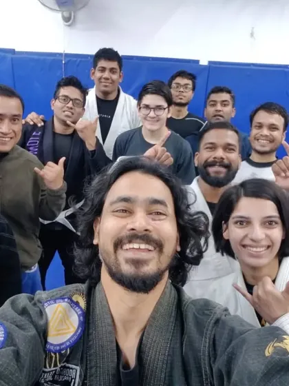A proud instructor with his students. Seeing them progress is the greatest reward.