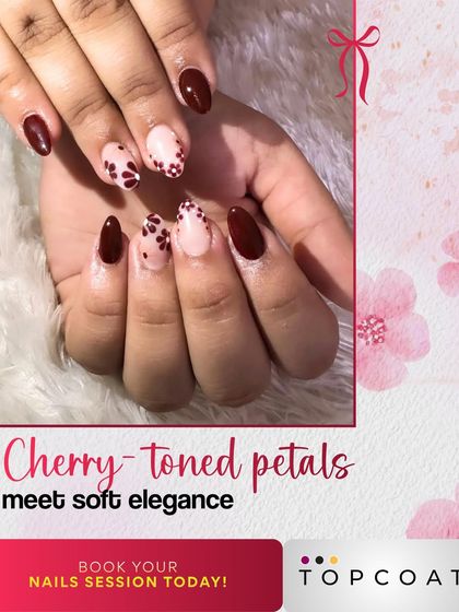 Cherry-toned petals meet soft elegance in this design. I paired a deep maroon gel polish with accent nails featuring delicate, hand-painted floral patterns for a polished and classy finish.