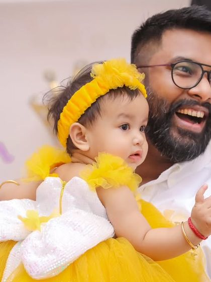 A vibrant 'Minions' themed birthday party, with yellow and blue decor, character cutouts, and fun props, creating a mischievous and joyful atmosphere.