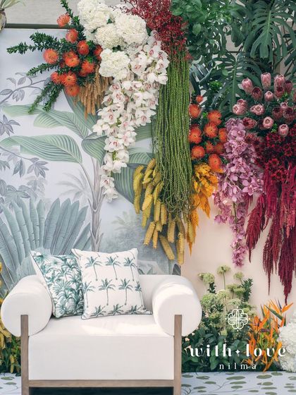 The 'Garden of Gaia' backdrop, a vibrant and lush setting for a joyous celebration.