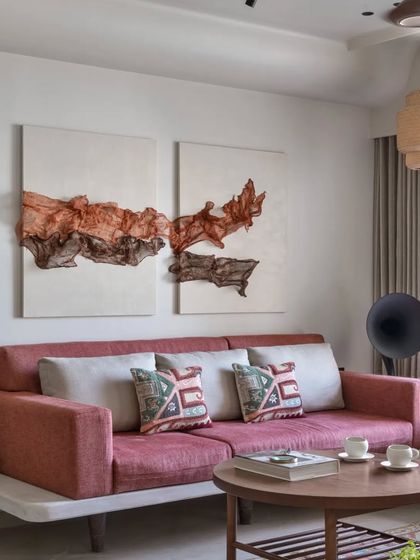 A closer look at the handmade living room, focusing on the custom fabric artwork and the unique floating sofa design. Every detail was crafted with care.