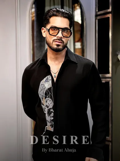Power dressing, redefined. The abstract face shirt is a statement of bold details and timeless attitude.