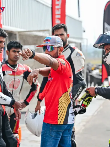 A pre-session briefing with our chief instructor, Anish Shetty. We believe in a structured approach, combining theory with practical application to ensure every rider understands the 'why' behind each technique before hitting the track.