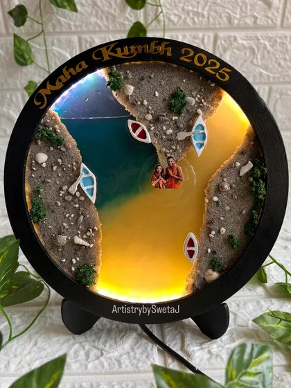 For those who made the sacred journey to Maha Kumbh, I created this special memento. It preserves the holy Ganga Jal and sand from the Triveni Sangam within a lighted frame, capturing the divine confluence of the rivers as a blessing for your home.