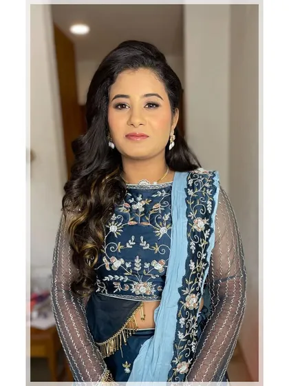 A full portrait of the Sangeet night glam. The makeup is designed to look fresh and luminous, ensuring she feels as beautiful as she looks throughout the entire event.