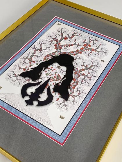 A close-up of a layered artwork featuring a 3D Trishul element. The gold metal frame and multi-layered matting add a sense of richness and dimension, highlighting the artwork's intricate composition.