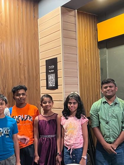 A group photo of our students and instructors, capturing the friendly and supportive community we've built at MusiGo.