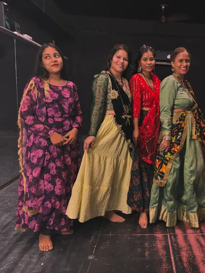 Candid moments from our Navratri celebration, showcasing the beautiful costumes and happy faces.