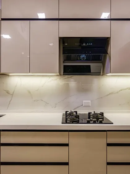 A close-up of the cooking area in the parallel laminate acrylic kitchen.