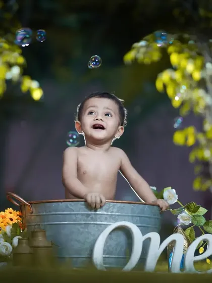 The pure, unfiltered joy of a first birthday. My post-cake smash tub-bath sessions are a favorite, turning messy fun into sparkling, happy memories.