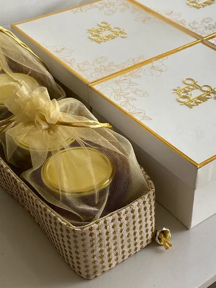 A beautifully arranged hamper featuring jars of my homemade treats, perfect for a family gift.