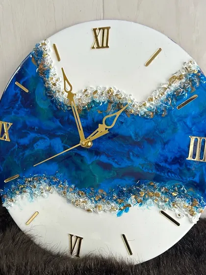 A stunning blue and gold geode clock, perfect as a statement piece for your wall.