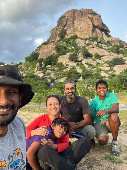 A group of friends, including Anupa and Adya, enjoying the view at the crag. The Romp is as much about the social connections as it is about the climbing.