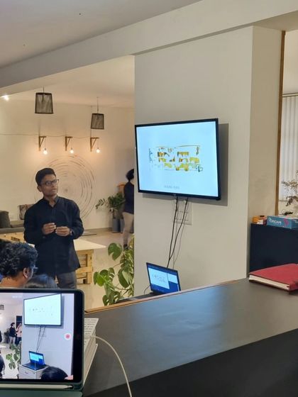 A wide shot of a presentation in our studio. We foster a collaborative environment where team members and guests can share and develop ideas together.