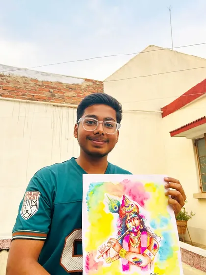 Me holding my watercolor painting of Lord Krishna, celebrating the festival of colors. This piece was inspired by the joy and vibrancy of Holi.