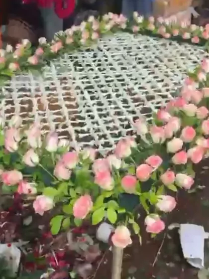 An example of a floral arrangement structure seen during the market visit. Students learn about different design possibilities and material requirements for large-scale event decor.
