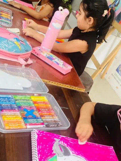 Here's another view of my art class in session. With all their supplies in front of them, these young artists are ready to dive into their macaw drawings, each one focused and engaged.