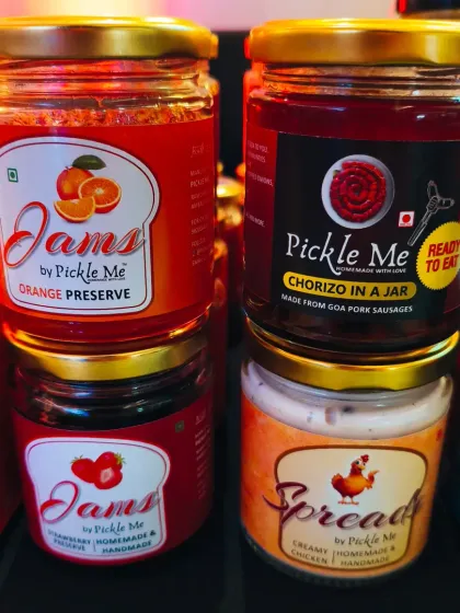 A stack of our sweet and savoury bestsellers. Featuring Orange Preserve, Strawberry Jam, Chorizo in a Jar, and our creamy Chicken Spread.