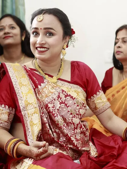 A candid moment from a baby shower celebration. I created a fresh and radiant makeup look with a classic red lip that enhanced her natural glow, perfect for this joyous occasion.