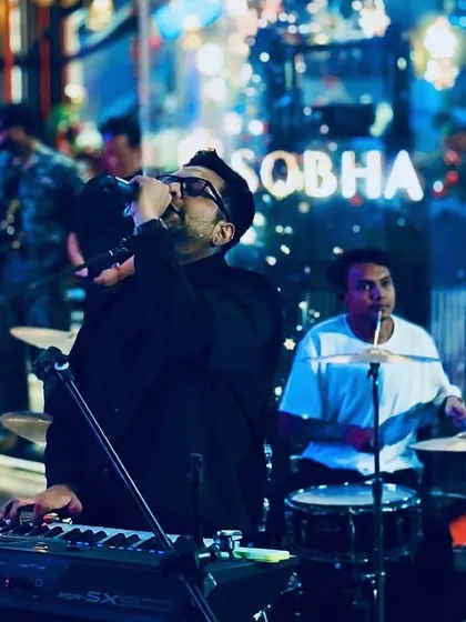 Performing at a corporate event for Sobha Realty. We tailor our setup and sound to fit any venue, from outdoor stages to elegant indoor ballrooms.
