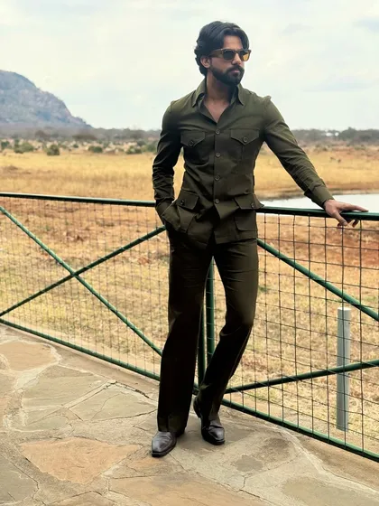 Adventure awaits in our bespoke Kenya safari suit. Tailored in a durable yet breathable fabric, this olive green ensemble is both functional and exceptionally stylish, ready for a game drive or a sundowner in the wild.