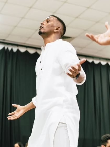 Expressing the emotion of the music while teaching. For me, dance is not just movement; it's feeling made visible.