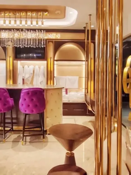 A glimpse into the Sleeep Boutique at ITC Maurya, where we blended opulence with a playful spirit. This luxury retail interior features custom gold metalwork, marble finishes, and vibrant fuchsia seating to create an unforgettable shopping experience.