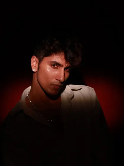 For male portfolios, I often use dramatic, low-key lighting to sculpt features and create a moody, intense portrait. This shot focuses on shadow and form to build a strong, compelling character.