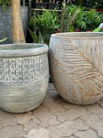 A new collection of fiber concrete planters. These lightweight pots feature beautiful, embossed patterns like this leaf motif, offering a rustic and artistic look with excellent durability.