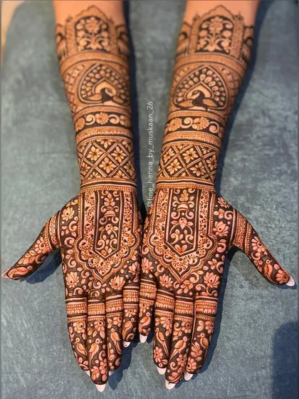 Even without figures, a bridal design can be breathtaking. This piece focuses on symmetry and traditional patterns like peacocks and architectural domes, creating a full and elegant look.