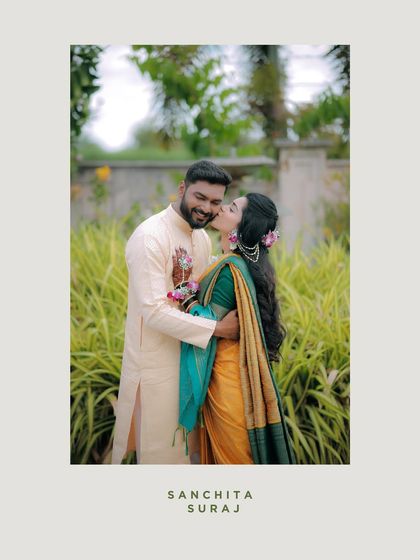 A heartwarming photo of the bride giving her groom a kiss on the cheek. It's a candid expression of 'pyar' that we were happy to capture.