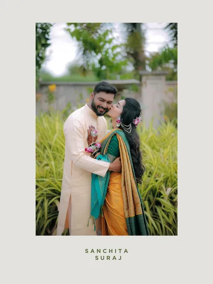 A heartwarming photo of the bride giving her groom a kiss on the cheek. It's a candid expression of 'pyar' that we were happy to capture.